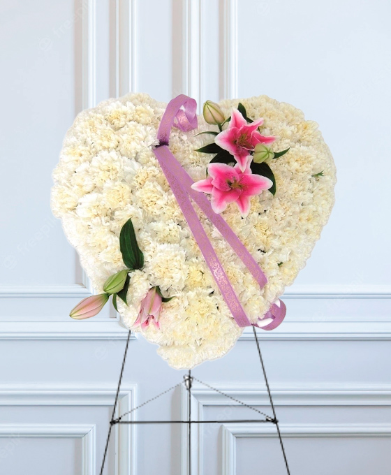 Corazón de claveles y liliums para Santander